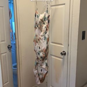 Medium size. Side slit dress summer dress. Dipper in back.